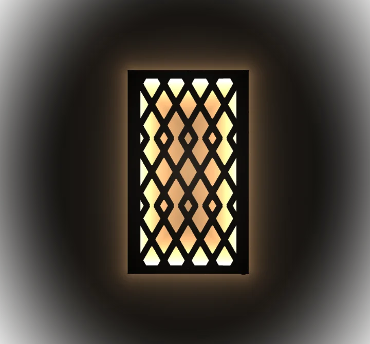 The frame after dark, its RGBW strip washing light across the wall behind the pattern.