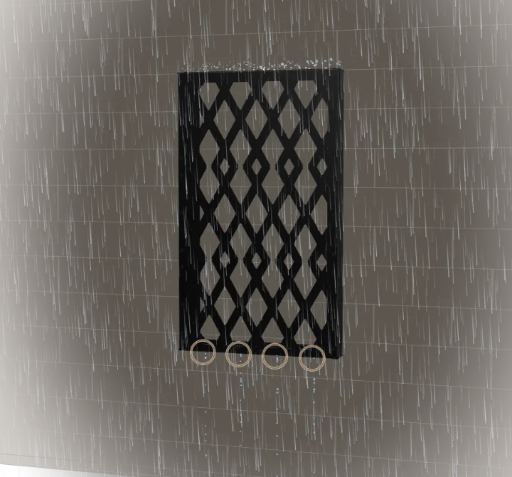 The anchored frame in a monsoon storm, wind-driven rain around it and water draining from the four weep holes along its bottom edge.